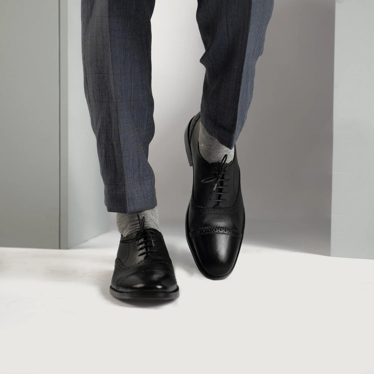 Styled On-Foot Perspective Demonstrating Ankle Fit & Silhouette on Model