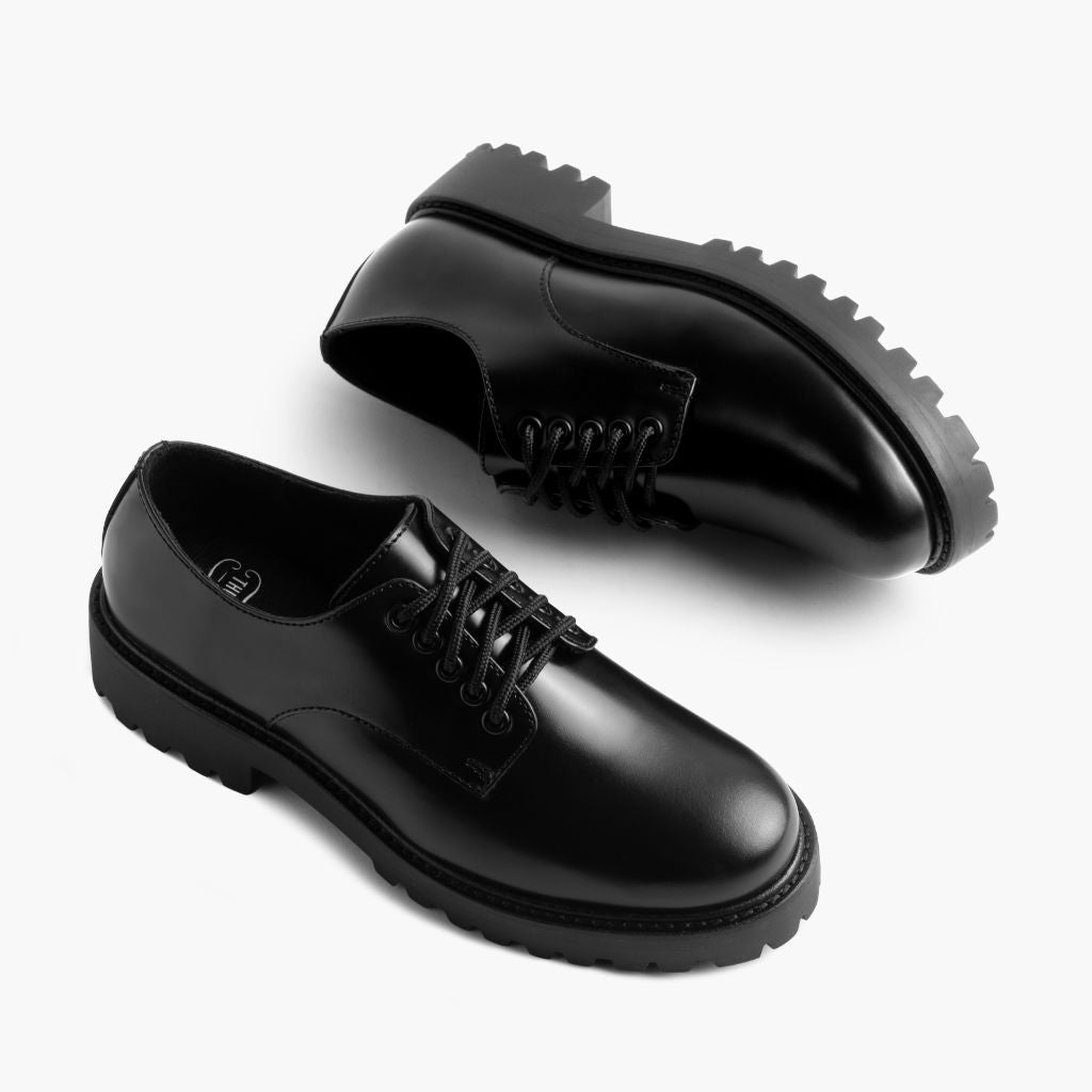 High-Traction Rubber Outsole & Lug Tread Pattern on Women's Renegade Black Leather Sneakers