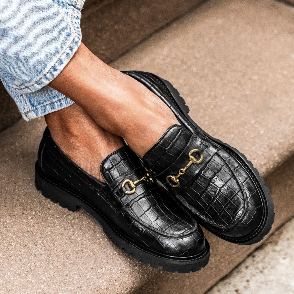 Styled On-Foot Perspective Demonstrating Ankle Fit & Silhouette on Model