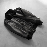 Styled Fit Perspective of Men's Airin G-1 Black Leather Bomber Jacket on Model - Natural Daylight Drape