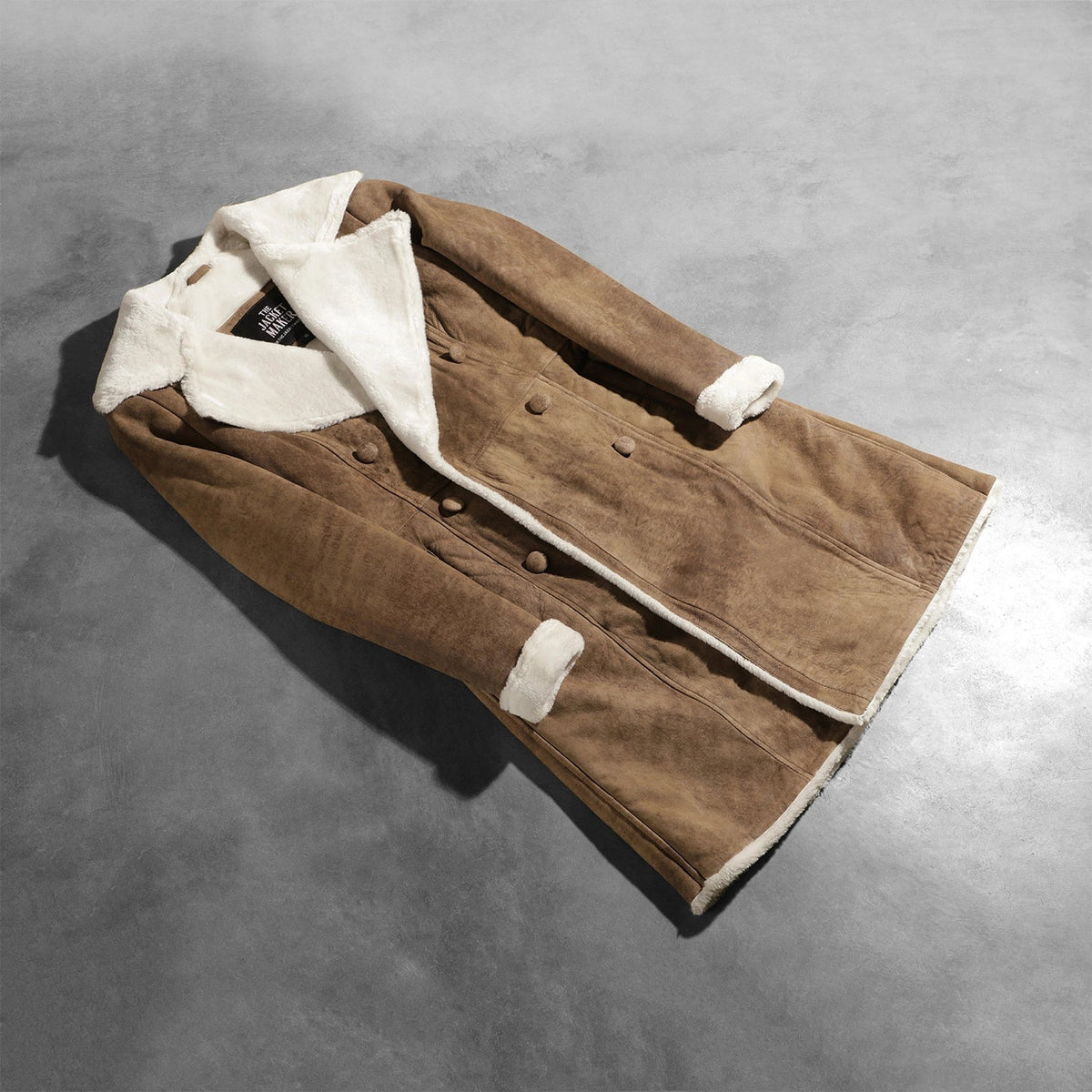 
Open Hem & Hem Craftsmanship Construction Detail on Women's Amie Distressed Brown Double Breasted Shearling Coat