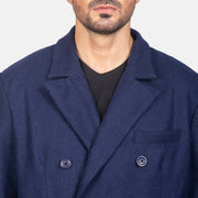 Close-Up Detail of Notch &amp; Button Hardware on Men's Blue Wool Double Breasted Coat