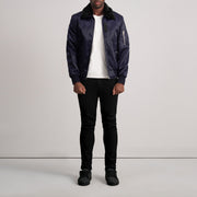 Close-Up Detail of Removable faux fur collar &amp; Zipper Hardware on Clyde B-15 Blue Bomber Jacket