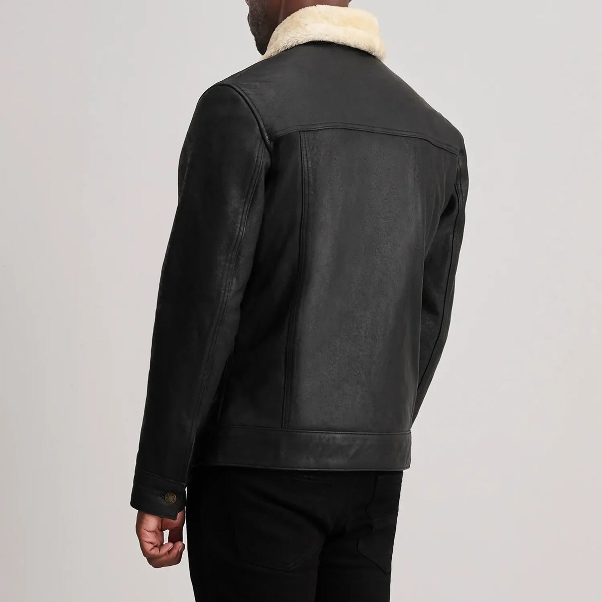 Close-Up Detail of Classic Collar &amp; Button Hardware on Dallis Tumbled Black Shearling Trucker Jacket