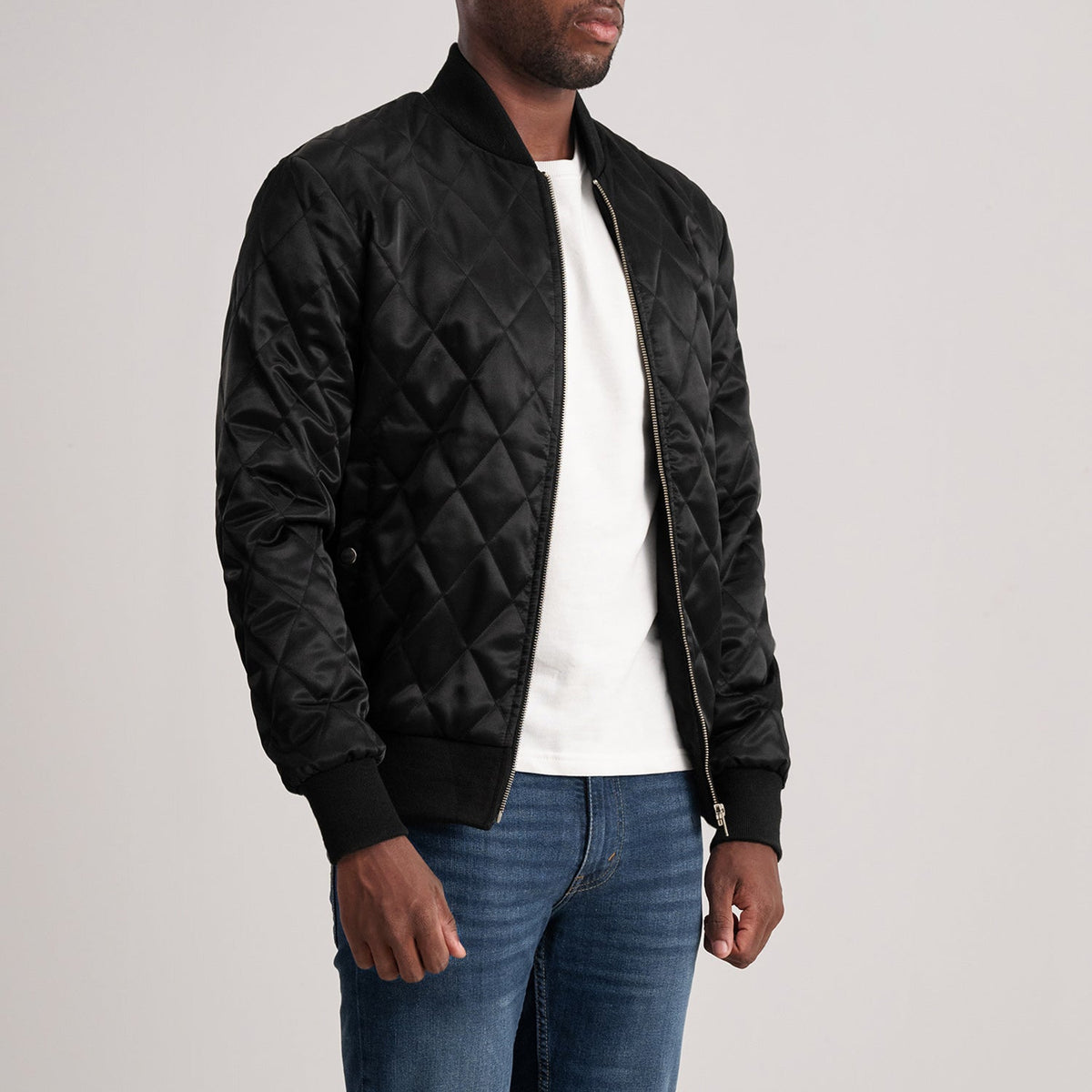 Danson Quilted Black Varsity Jacket - Lateral Side Profile View Showing Sleeve Cut &amp; Athletic Taper Fit