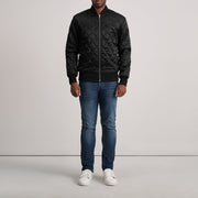Close-Up Detail of Varsity &amp; Zipper Hardware on Danson Quilted Black Varsity Jacket