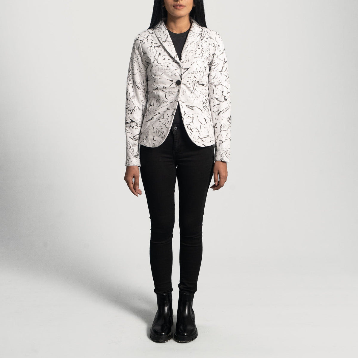 Close-Up Detail of Notch &amp; Button Hardware on Women's Donna Blake White Leather Blazer