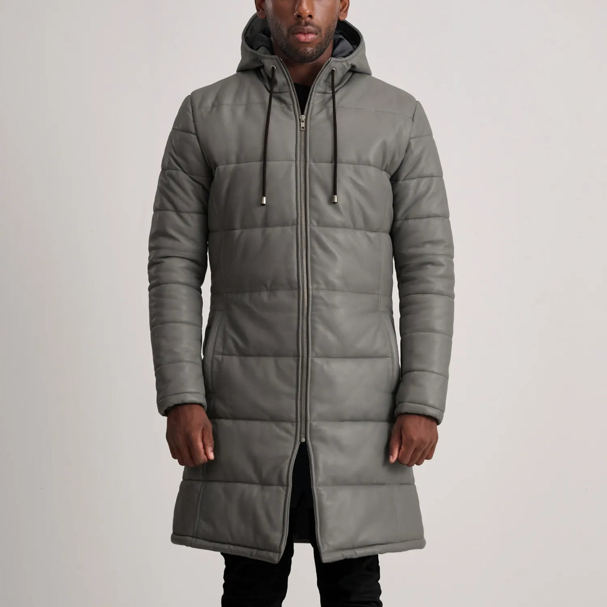 
Tailored Rib Cuffs & Hem Craftsmanship Construction Detail on Floyd Tan Hooded Leather Puffer Coat