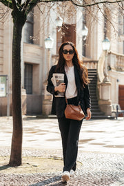 Styled Fit Perspective of Chili Full-Grain Leather Handbag on Model - Natural Daylight Drape