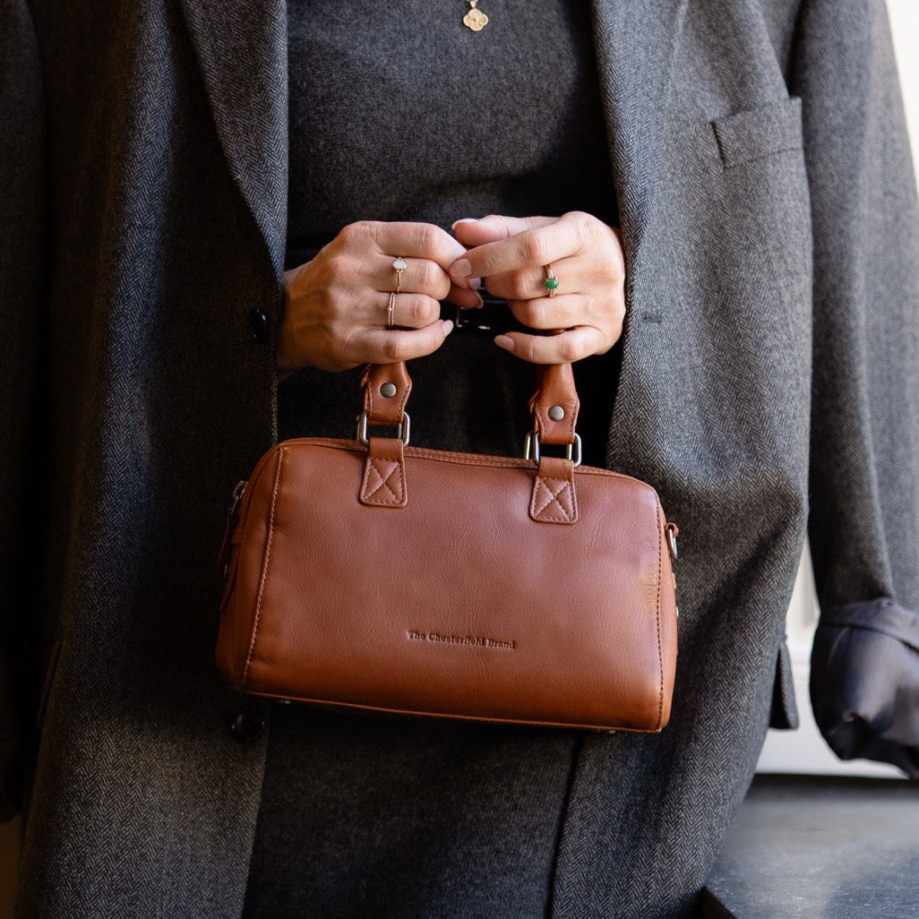 Styled Fit Perspective of Dalford Full-Grain Leather Handbag on Model - Natural Daylight Drape