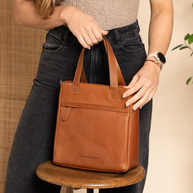Styled Fit Perspective of Lingfield Full-Grain Leather Handbag on Model - Natural Daylight Drape