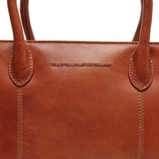 Styled Fit Perspective of Pergamino Full-Grain Leather Handbag on Model - Natural Daylight Drape
