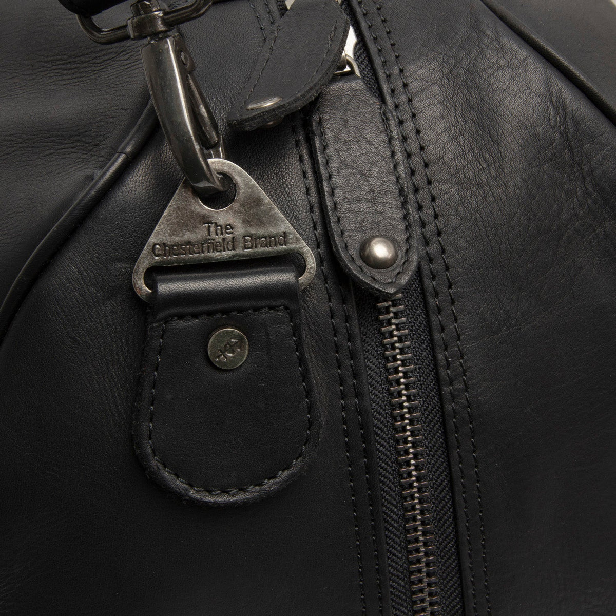 Solid Antique Brass Hardware &amp; Heavy-Duty Dual Zipper Detail on Rivaro Full-Grain Leather Weekender Bag