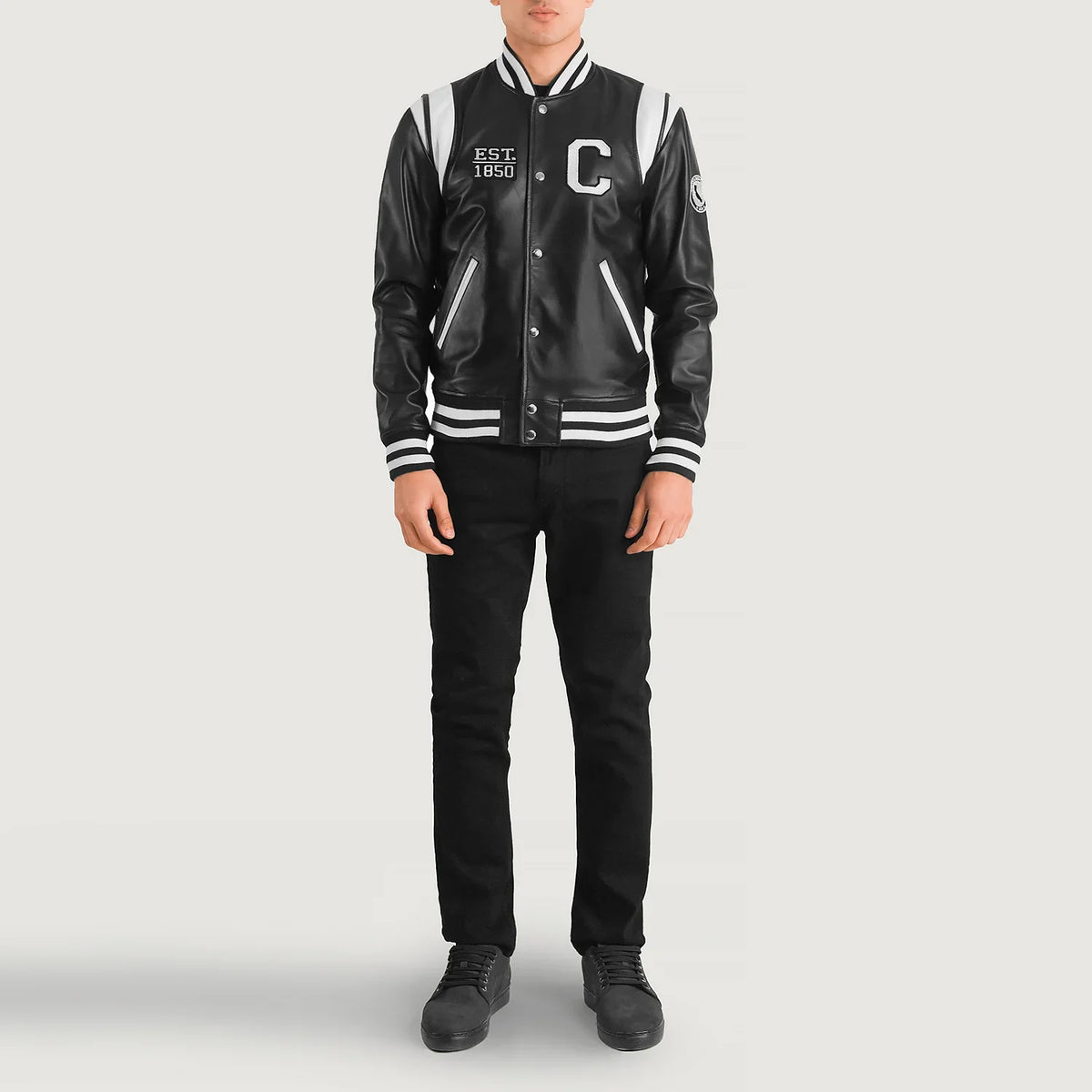 
Liberte California Black Leather Varsity Jacket - Lateral Side Profile View Showing Sleeve Cut & Athletic Taper Fit