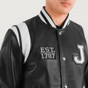 Close-Up Detail of Varsity &amp; Snap Button Hardware on Liberte New Jersey Black Leather Varsity Jacket