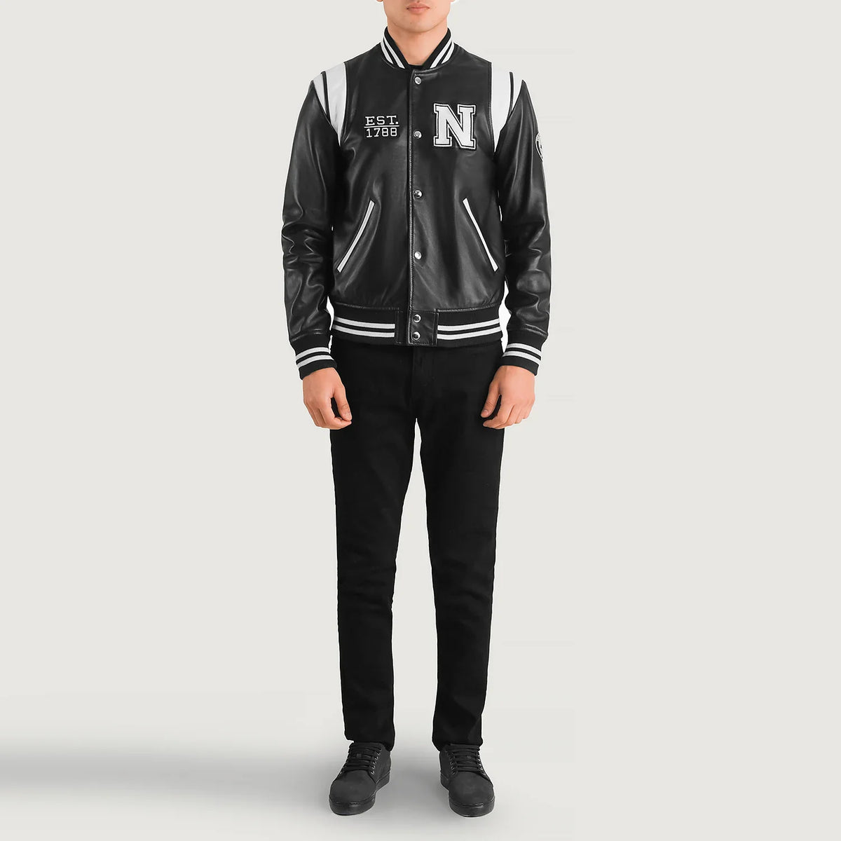 Liberte New York Black Leather Varsity Jacket - Lateral Side Profile View Showing Sleeve Cut &amp; Athletic Taper Fit