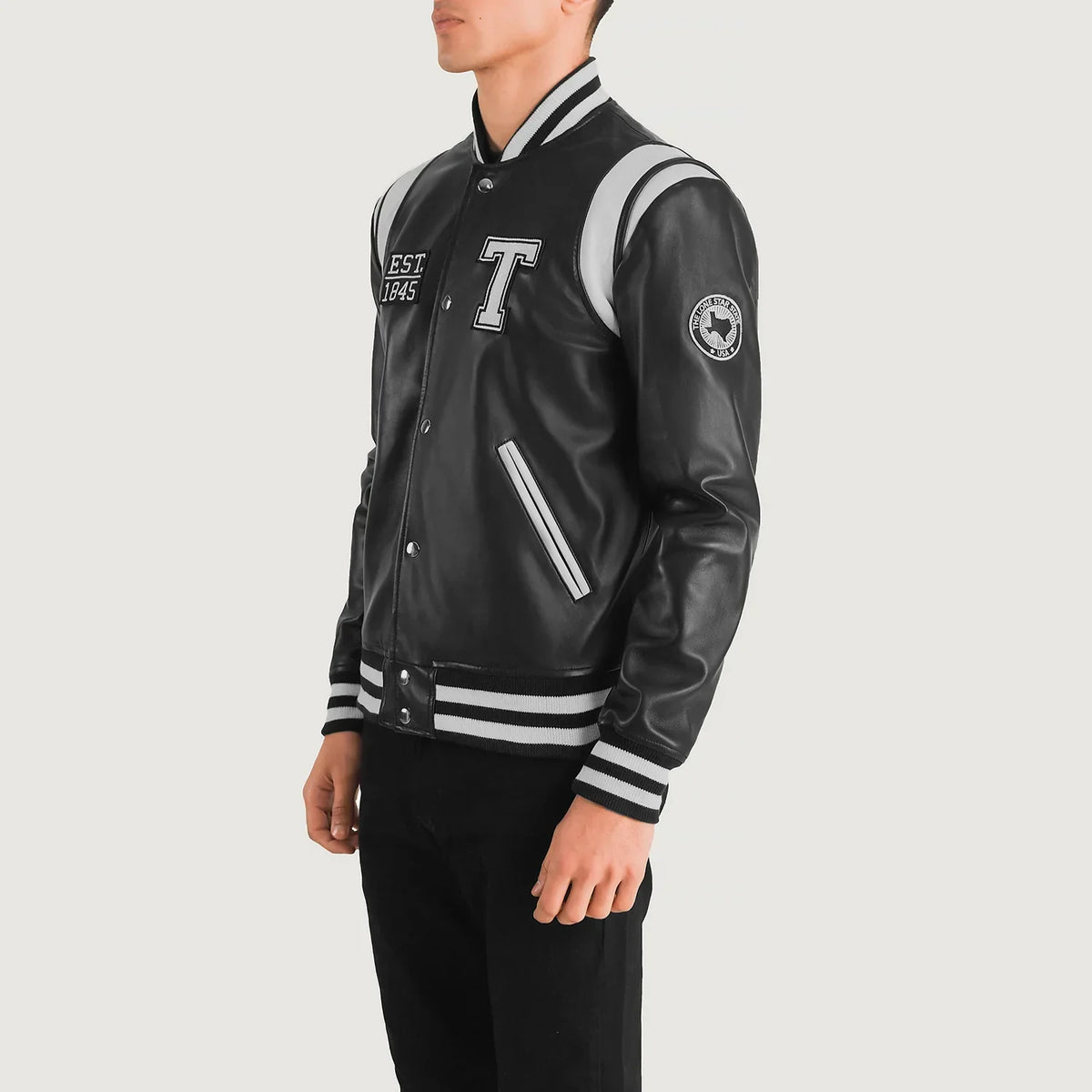 
Black & White Sheepskin Leather Varsity Jacket - Back View Showing Tailored Shoulder Fit & Clean Hemline