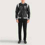 
Liberte Texas Black Leather Varsity Jacket - Lateral Side Profile View Showing Sleeve Cut & Athletic Taper Fit