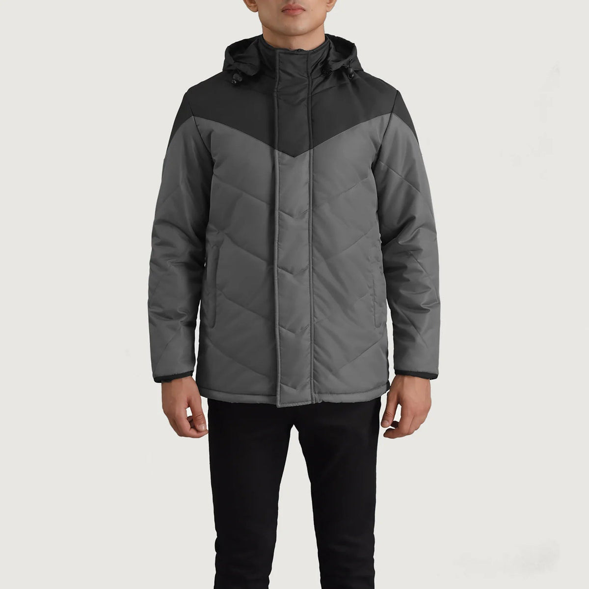 
Close-Up Detail of Classic Collar & Zipper With Velcro Placket Hardware on Luka Black & Grey Hooded Puffer Jacket