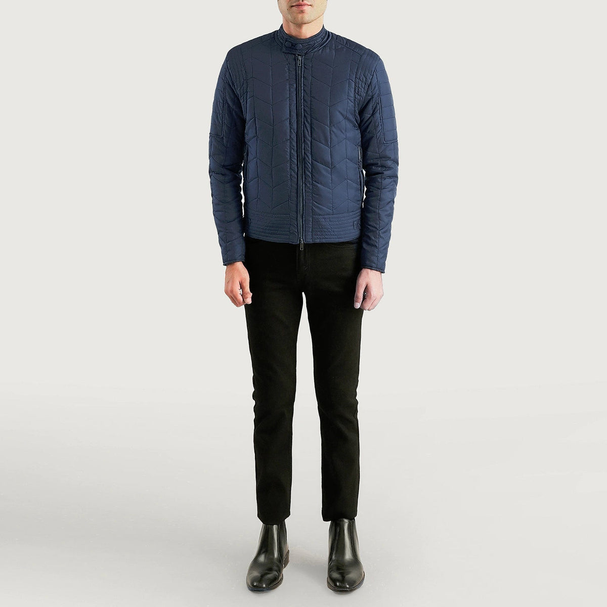 Close-Up Detail of Snap Button Band &amp; Zipper Hardware on Men's Nyle Quilted Windbreaker Jacket