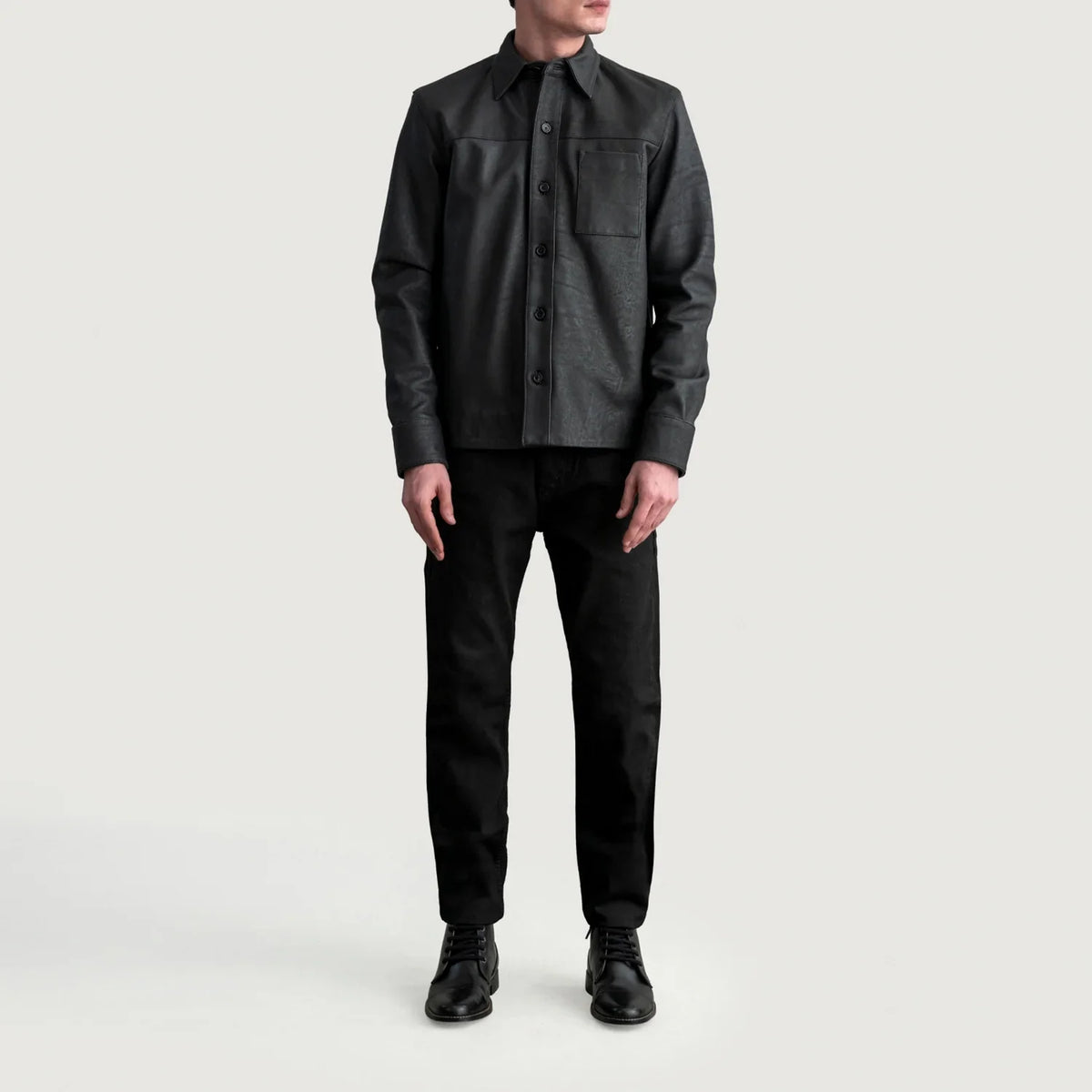 
Close-Up Detail of Shirt & Buttons Hardware on Scout Tumbled Black Leather Shirt