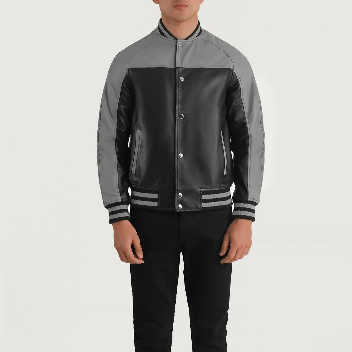 Close-Up Detail of Varsity & Snap Buttons Hardware on Terrance Black & Red Leather Varsity Jacket
