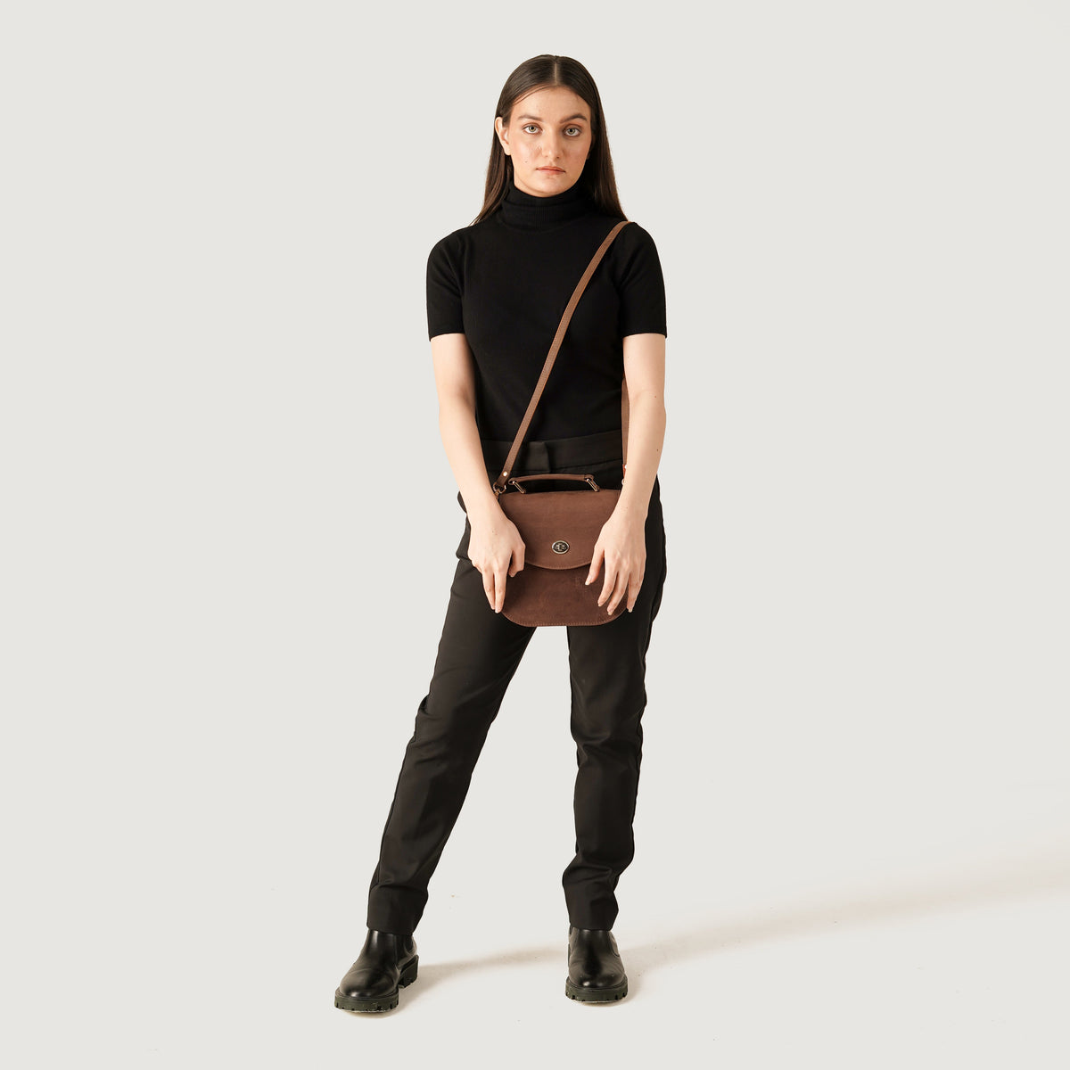 
Tan Full Grain Naturally Milled Cowhide Leather. Leather Bag - Rear Perspective Showing Reinforced Leather Straps & Stitching