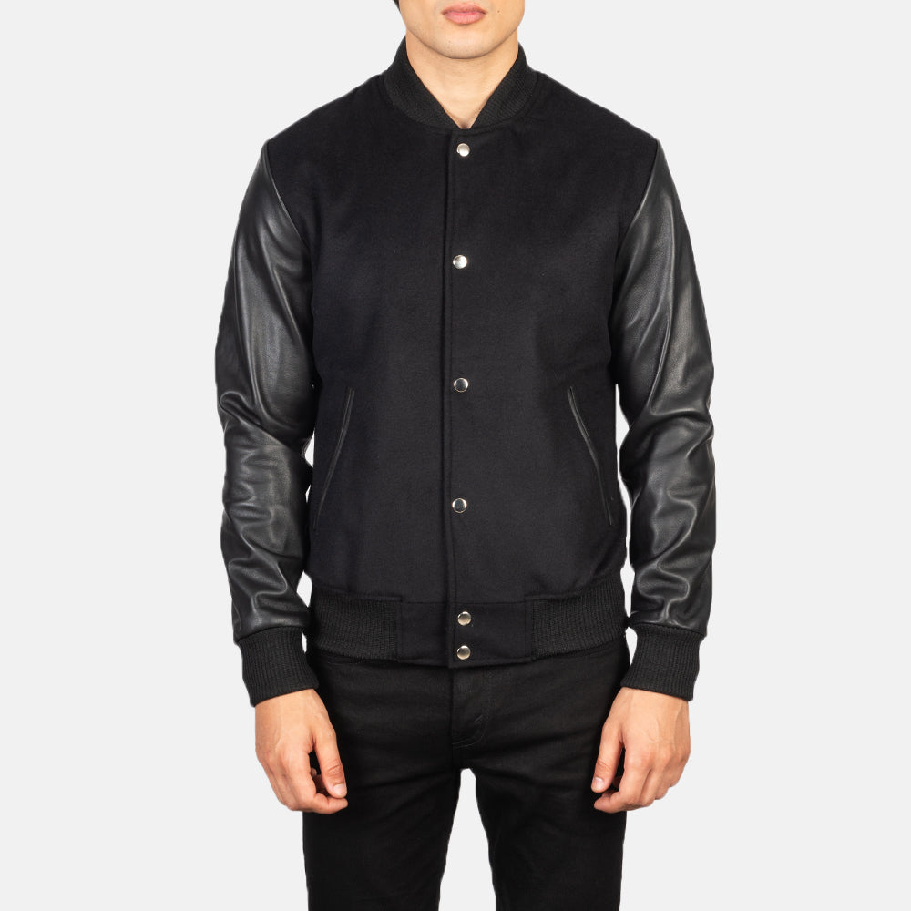 Close-Up Detail of Varsity &amp; Snap Buttons Hardware on Men's Vaxton Black Hybrid Varsity Jacket