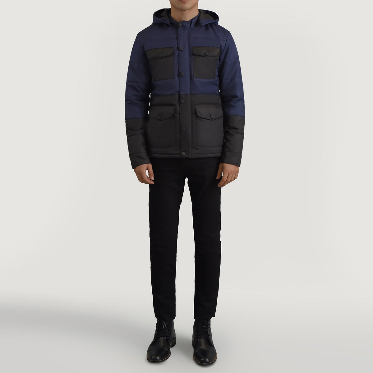 
Wayne Black & Blue Hooded Puffer Jacket - Lateral Side Profile View Showing Sleeve Cut & Athletic Taper Fit