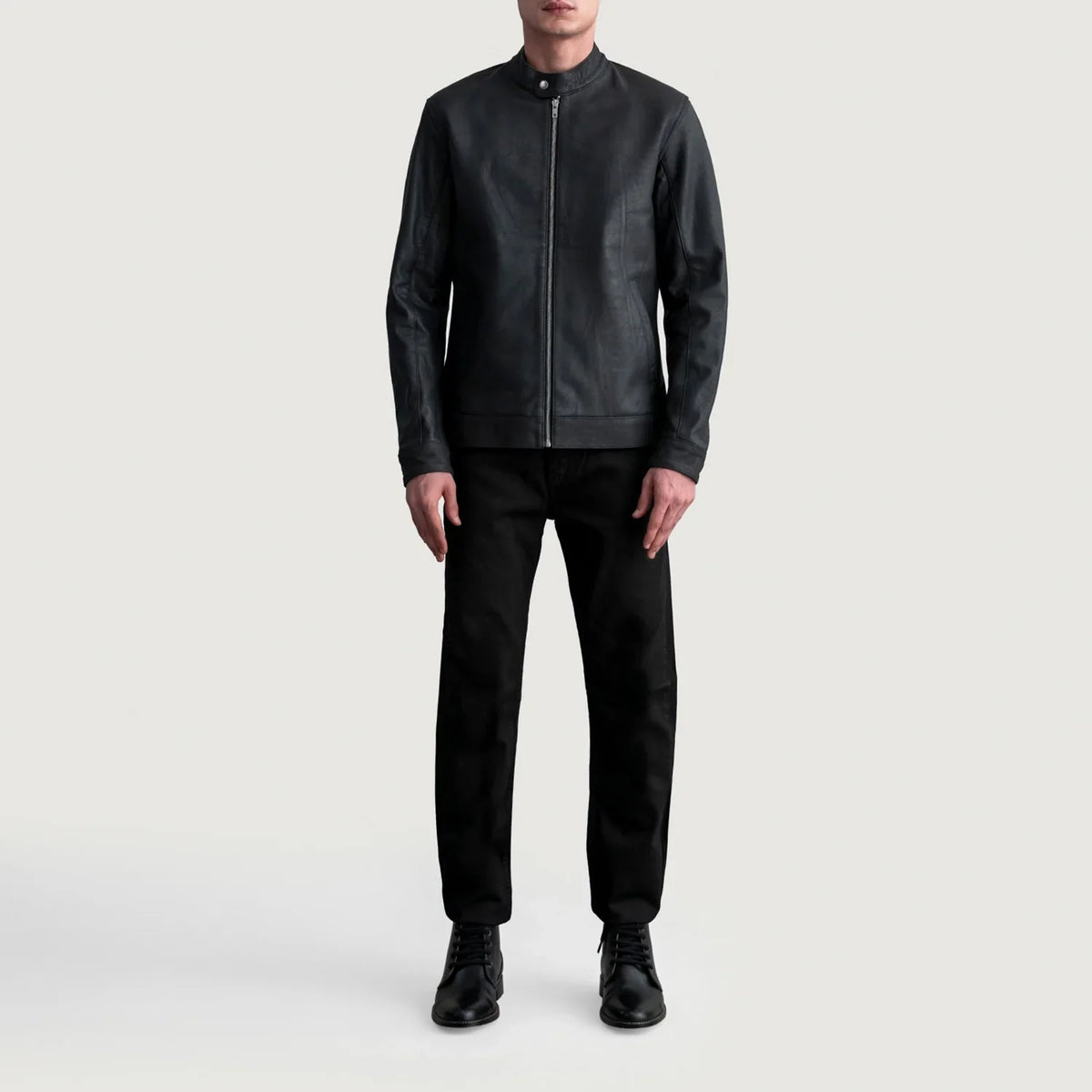 
Close-Up Detail of Snap Button & Zipper Hardware on Zen Tumbled Black Leather Biker Jacket